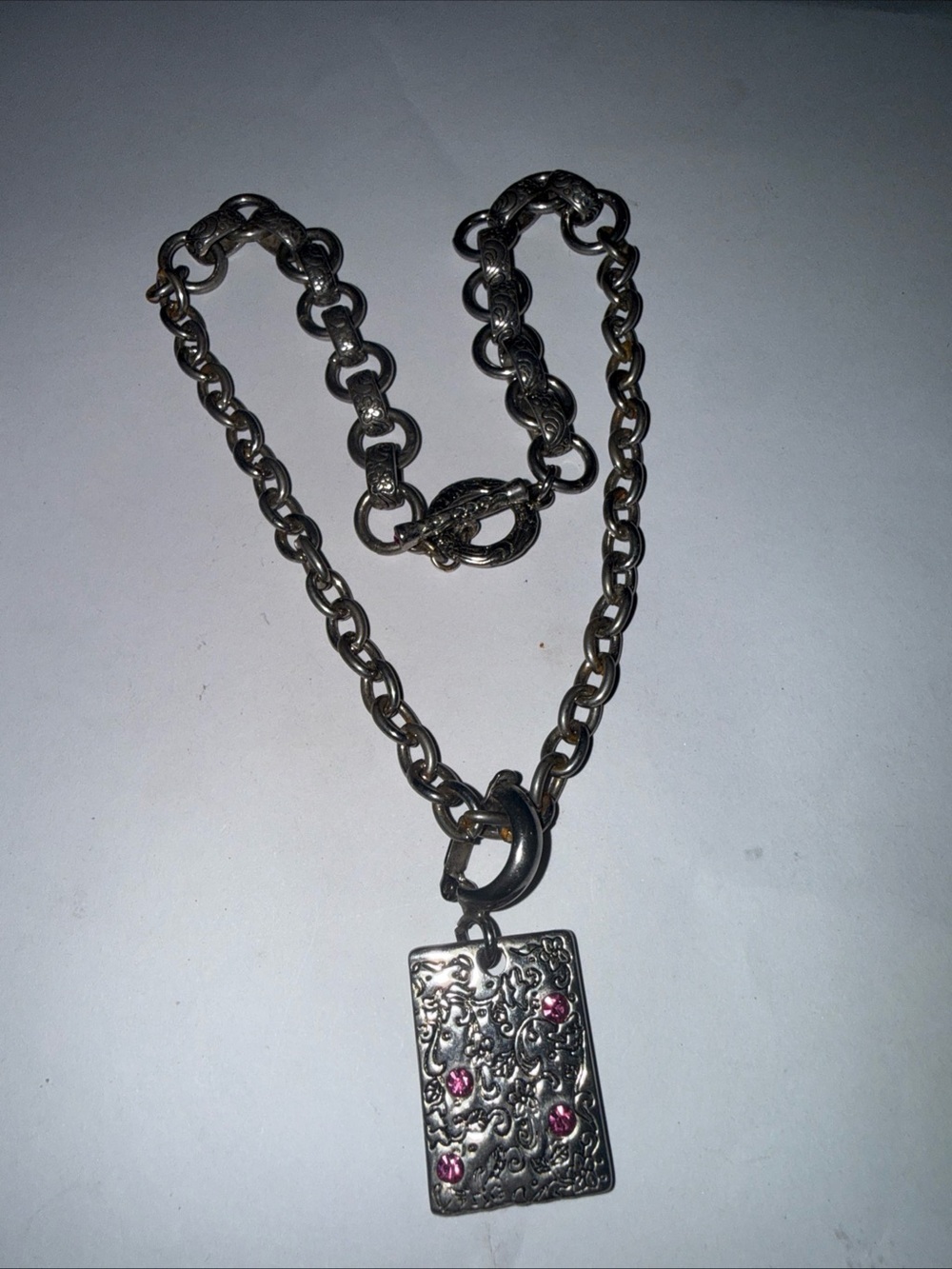 Silver-Tone Ornate Rectangular Pendant Necklace with Pink Accents
